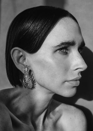 <p>frond hoop earrings - 1.5"</p><span>antique diamonds</span><span>circa 1920</span>