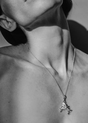 <p>frond pendant</p><span>antique emerald</span><span>circa 1940</span>