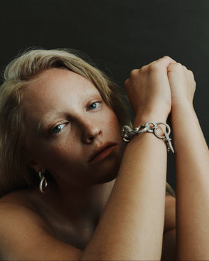 PAVÉ CURLED HOOP EARRINGS