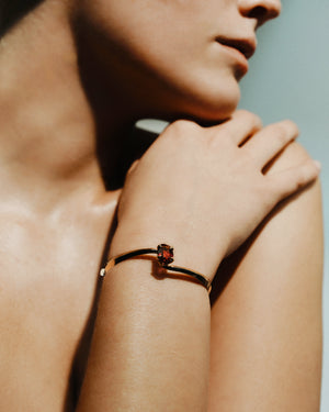 <p>frond spiral cuff bracelet</p><span>antique garnet</span><span>circa 1950</span>