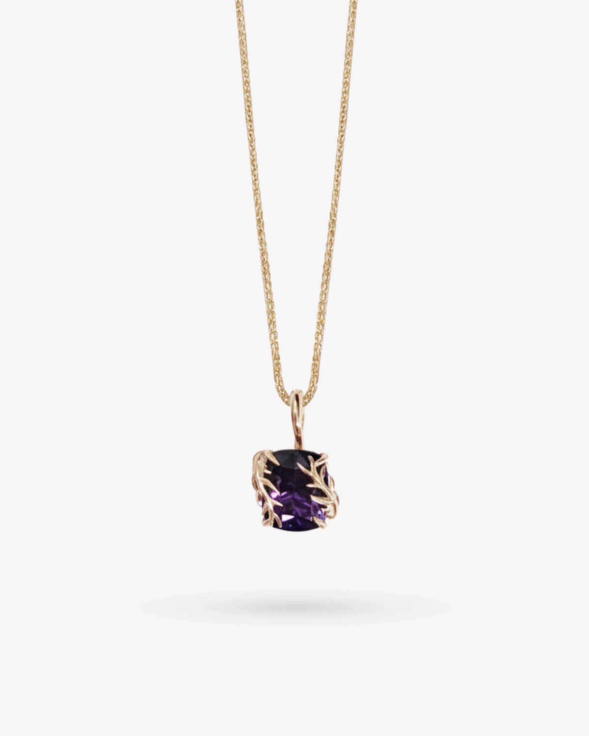 <p>frond pendant</p> <span> antique amethyst </span> <span> circa 1950</span>