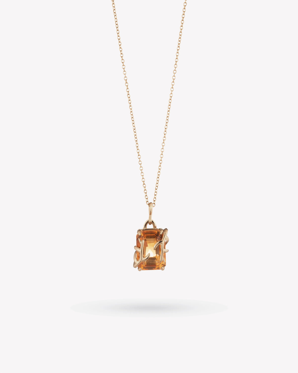 <p>frond pendant</p> <span> antique citrine </span> <span> circa 1930</span>