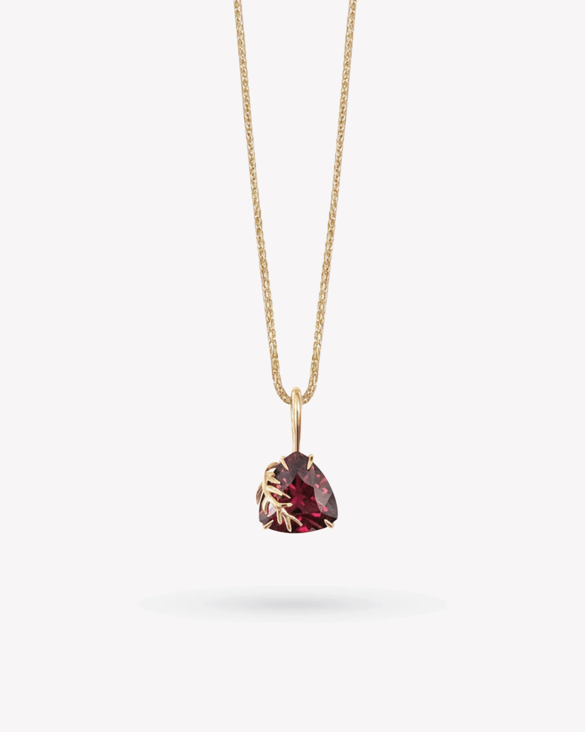 <p>frond pendant</p> <span> antique garnet </span> <span> circa 1930</span>