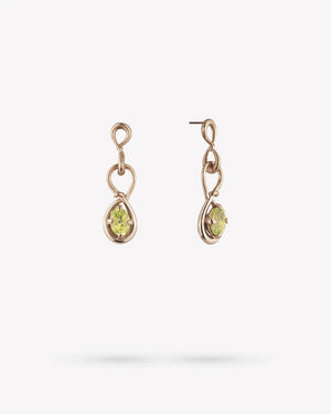 <p>frond charm drop earrings</p><span>antique peridots</span><span>circa 1940</span>