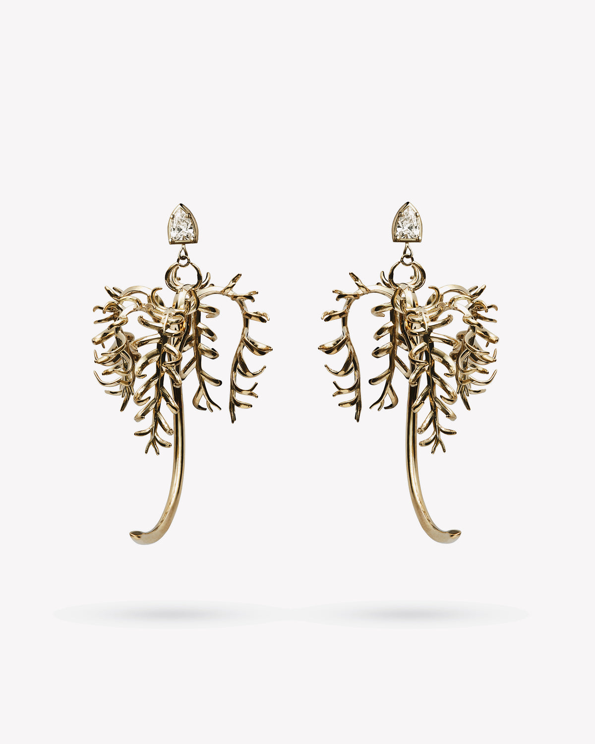 <p>palm earrings</p><span>antique diamonds</span><span>circa 1940</span>