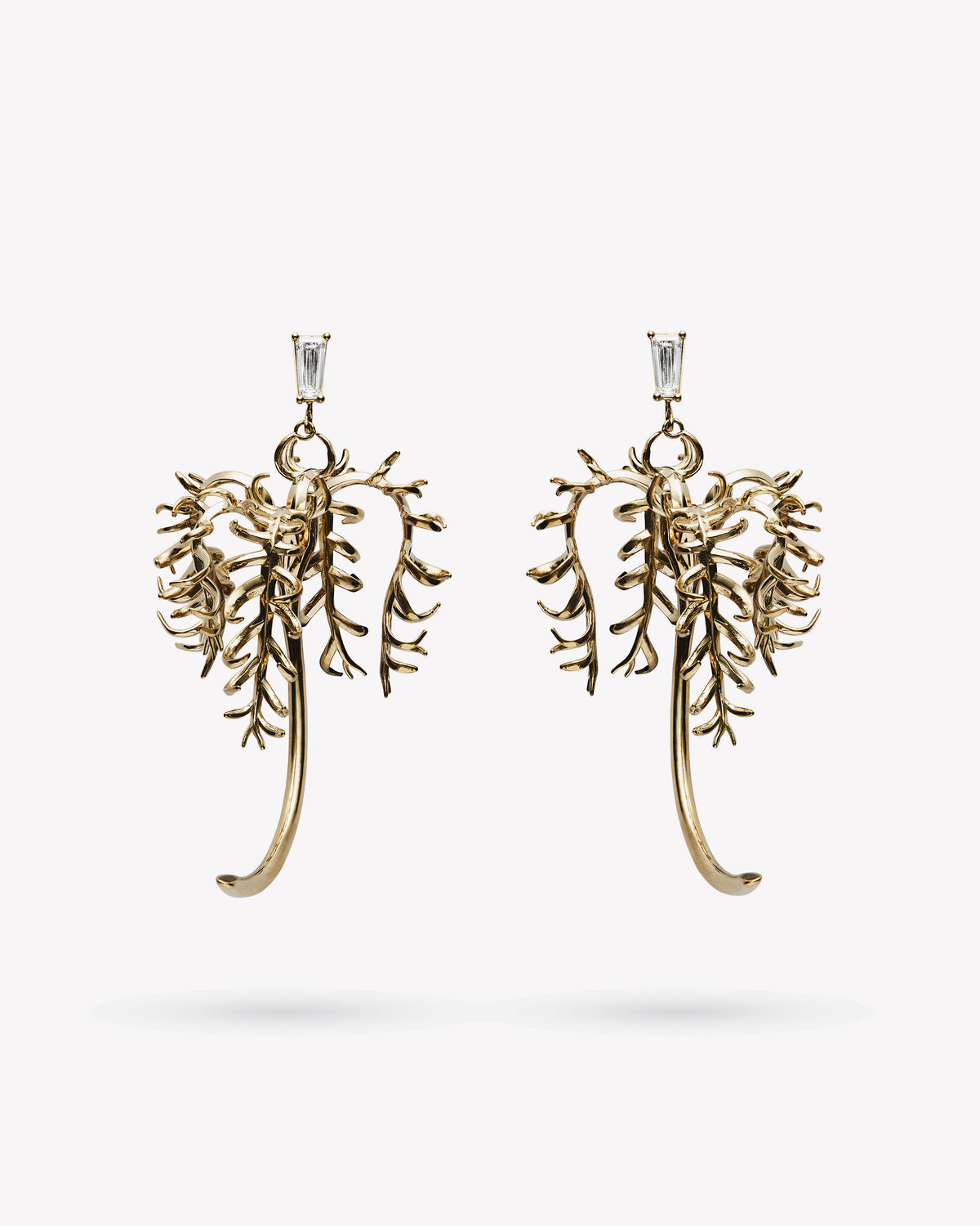 <p>palm earrings</p><span>antique diamonds</span><span>circa 1920</span>