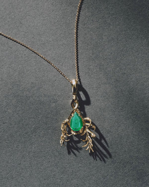 <p>frond pendant</p><span>antique emerald</span><span>circa 1940</span>