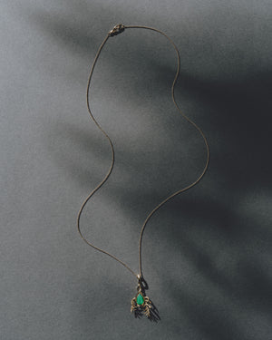 <p>frond pendant</p><span>antique emerald</span><span>circa 1940</span>