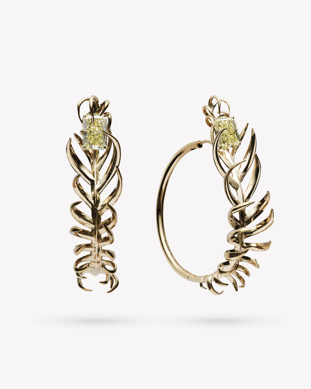 <p>frond hoop earrings - 1.5"</p><span>antique diamonds</span><span>circa 1920</span>