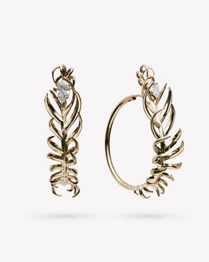 <p>frond hoop earrings - 1.5"</p><span>antique diamonds</span><span>circa 1920</span>